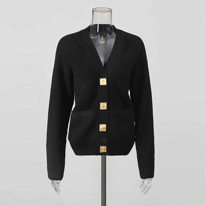 Black women's v neck knitted cardigan with gold buttons and a stylish ribbed texture