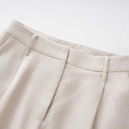 Women's vest pantsuit set in beige featuring tailored trousers for a stylish look