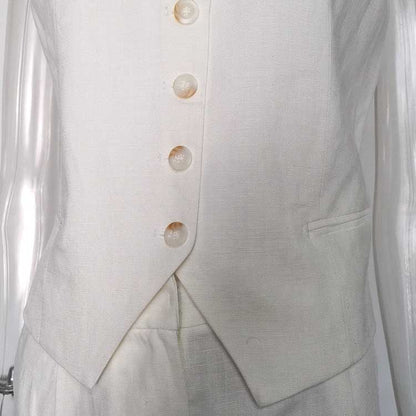 Elegant women's vest pantsuit set in cream with stylish buttons and tailored fit