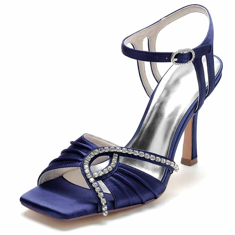 Elegant women's wedding ankle strap heels in navy blue satin with rhinestone detailing