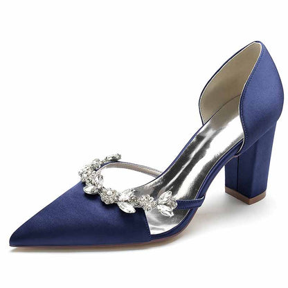 Elegant blue women's wedding dress pumps with decorative embellishments and a stylish block heel
