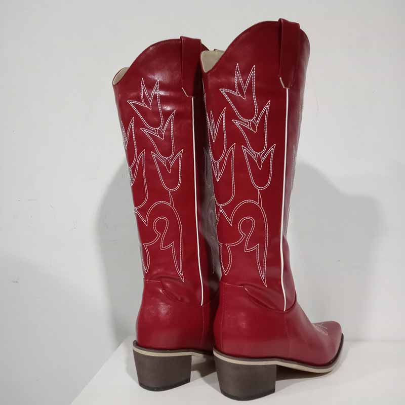Red women's western embroidered boots with stylish floral designs and a classic cowboy silhouette