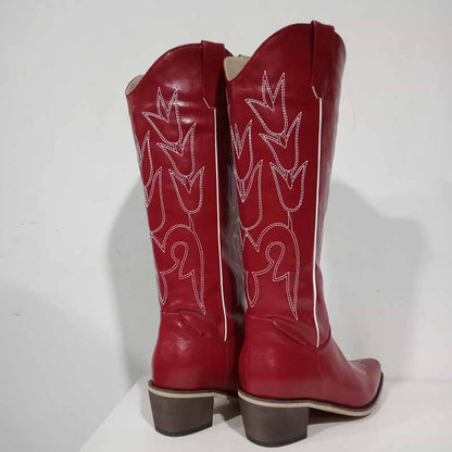 Red women's western embroidered boots with stylish floral designs and a classic cowboy silhouette