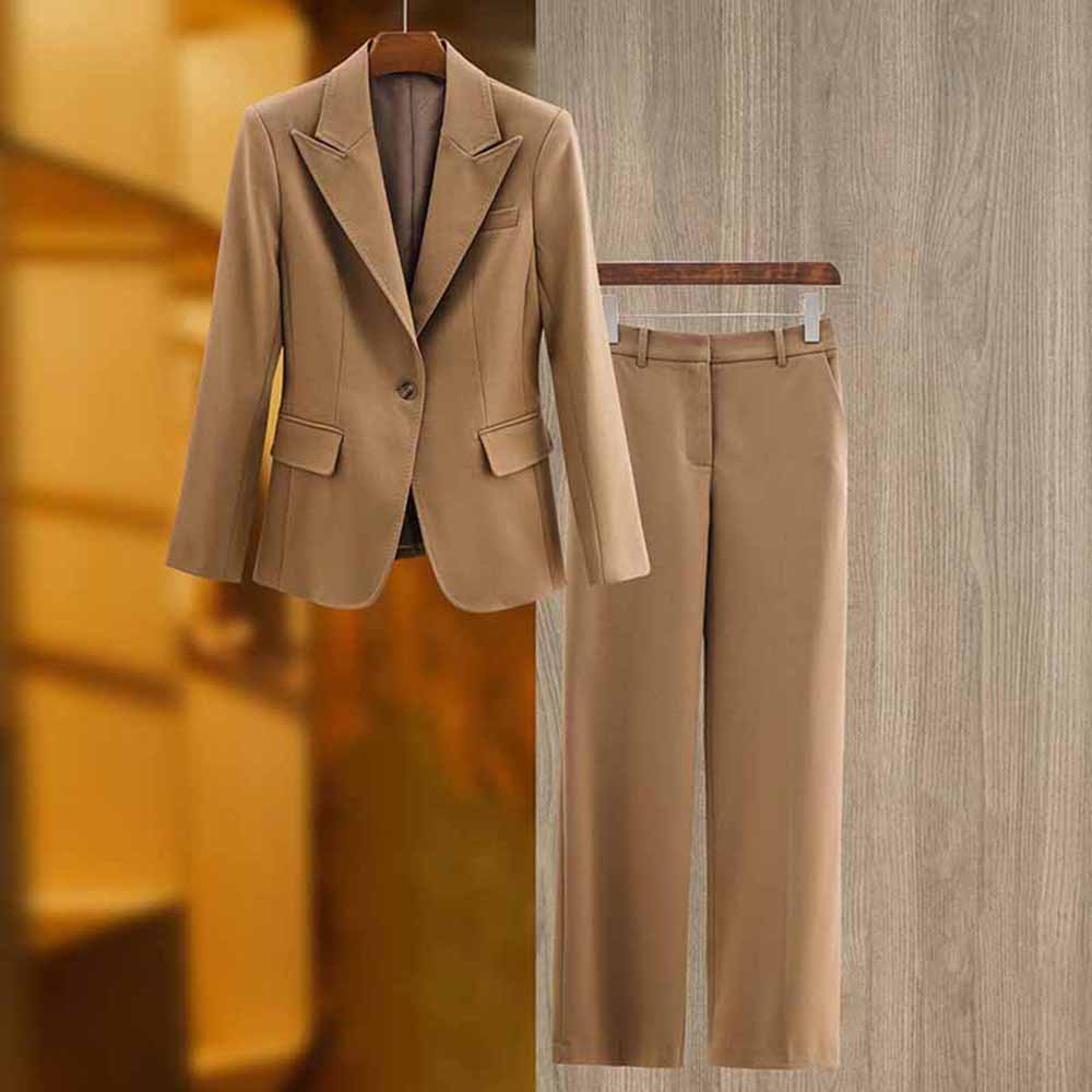 Stylish women's white pantsuit set featuring a tailored blazer and pants for professional settings
