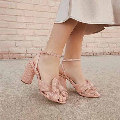 Pink bridal bow knot heeled sandals with a stylish design and comfort for wedding occasions