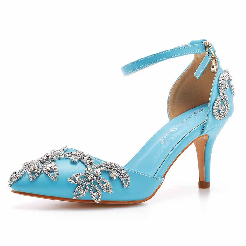 Elegant blue bridal crystal heels for wedding featuring intricate floral embellishments and a stylish ankle strap