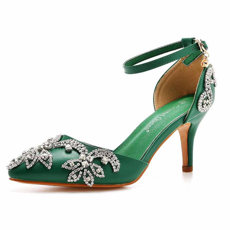 Elegant green bridal crystal heels for wedding with intricate embellishments and ankle strap