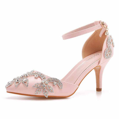 Elegant pink bridal crystal heels for wedding featuring intricate floral embellishments and a sleek ankle strap