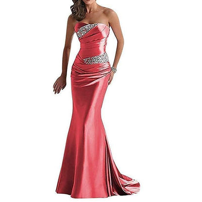 Elegant beaded mermaid evening dress in pink with a strapless design and fitted silhouette