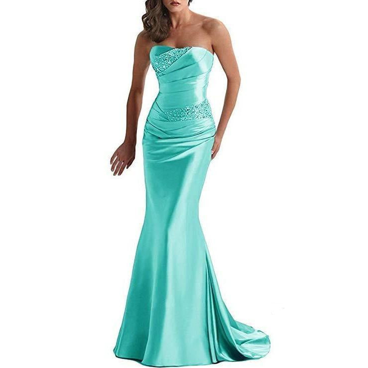 Elegant turquoise beaded mermaid evening dress with a strapless design and fitted silhouette
