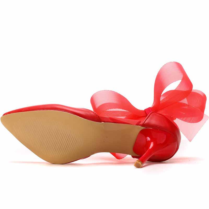 Red bridal closed toe high heel sandals with a large bow for elegant wedding shoes