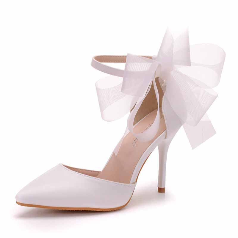 bridal closed toe high heel sandals with elegant bow detail for wedding or special occasions