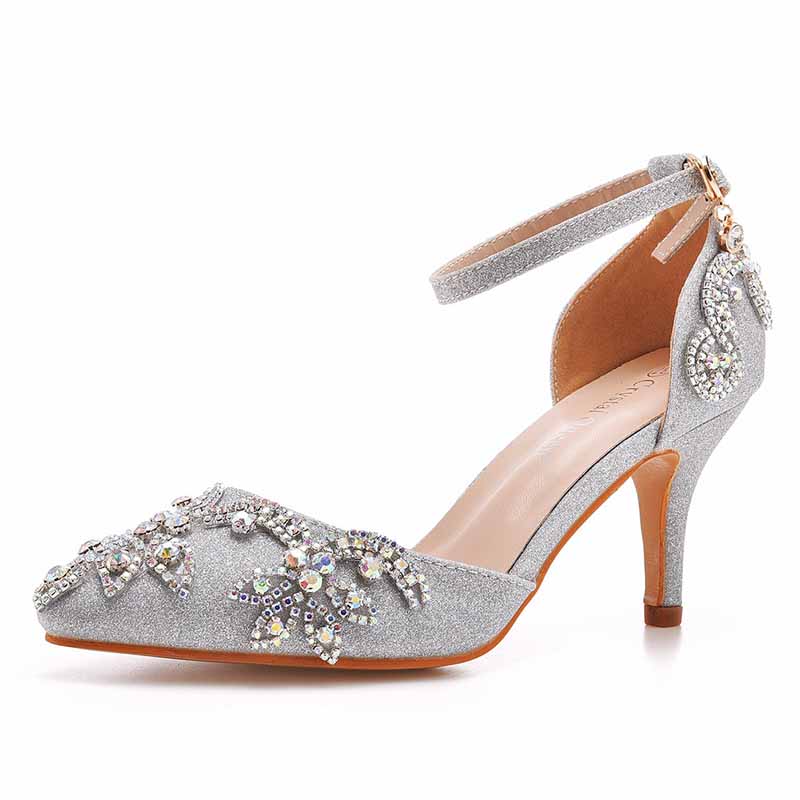 Elegant bridal crystal heels for wedding featuring silver accents and ankle strap for a stunning look