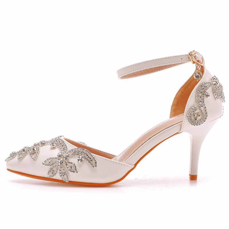 Elegant bridal crystal heels for wedding with embellished floral design and ankle strap for added support