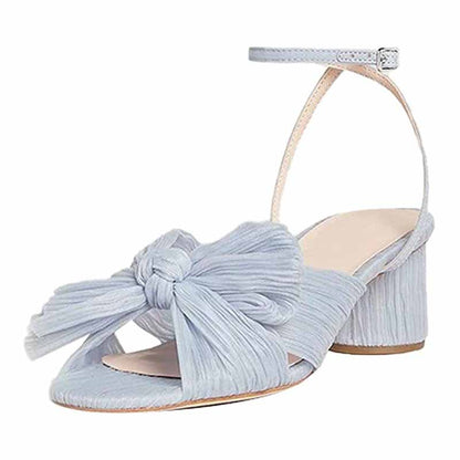 Light blue bridal bow knot heeled sandals featuring a stylish bow detail and ankle strap