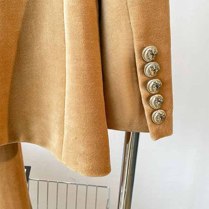 Elegant camel velvet women's pantsuit featuring decorative buttons on the jacket sleeves