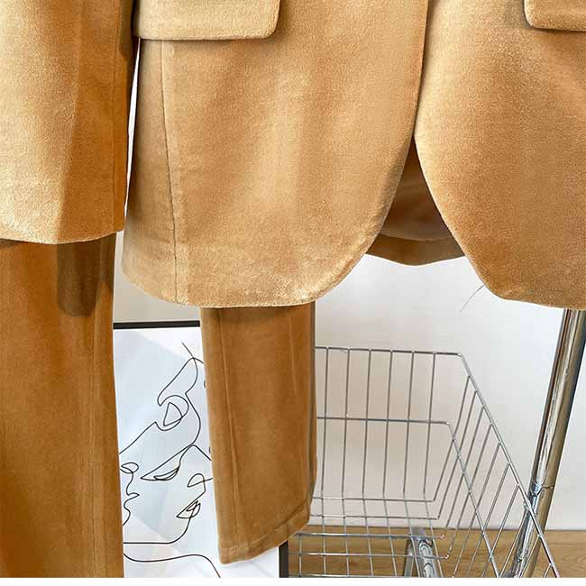 Camel velvet women's pantsuit featuring a stylish blazer and tailored pants for a chic look