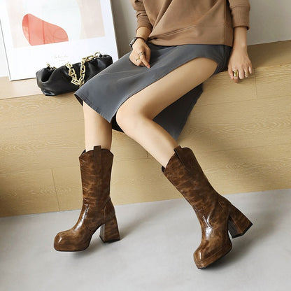 Stylish chunky block heel booties for women in brown, perfect for pairing with skirts and casual outfits
