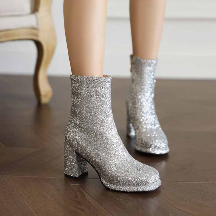 Sparkling silver chunky heel party boots for women with a stylish design for festive occasions