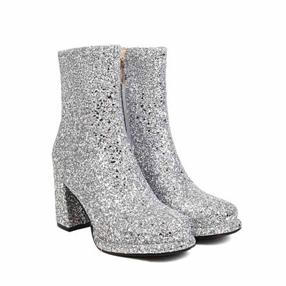 Shiny silver chunky heel party boots for women with a stylish zipper detail