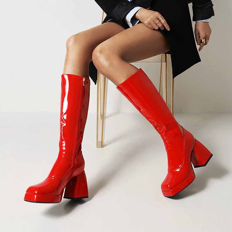 Glossy red women's knee high boots with chunky heel, perfect for stylish winter outfits