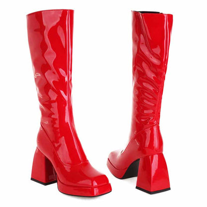 Red women's knee high boots with chunky heel featuring a glossy finish and stylish design