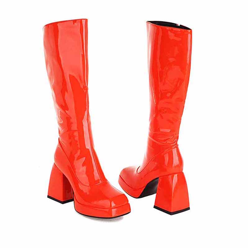 Stylish red women's knee high boots with chunky heel for a bold fashion statement