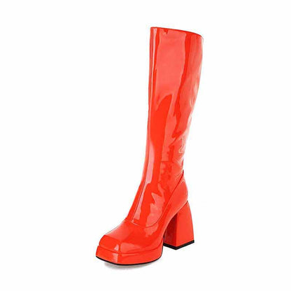 Stylish women's knee high boots with chunky heel in vibrant red for a trendy look