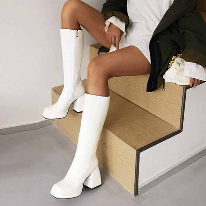 Trendy women's knee high boots with chunky heel in white, perfect for stylish outfits and casual wear.