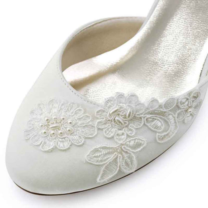 Elegant closed toe bridal shoes low heel with intricate floral embroidery for weddings