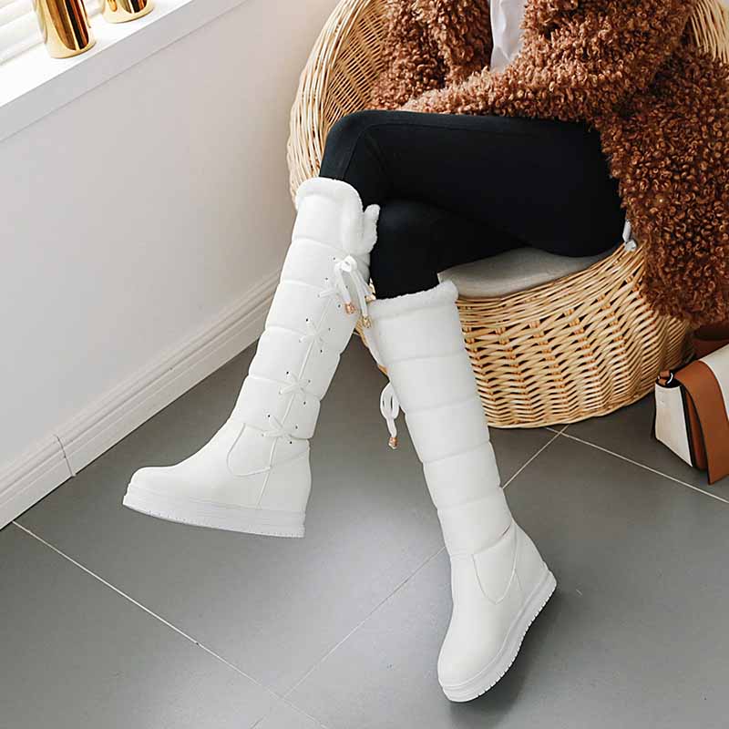 Stylish white cute winter boots for women with lace-up design, perfect for cozy winter days