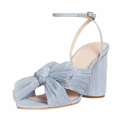 Light blue bridal bow knot heeled sandals with pleated design and ankle strap for elegant occasions
