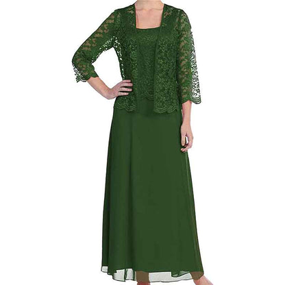 Elegant mother of the bride outfit in deep green with lace jacket and flowing skirt
