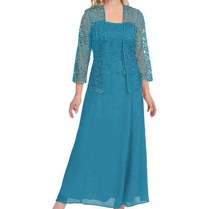 Elegant mother of the bride outfit in teal with lace detail and matching jacket for a sophisticated look