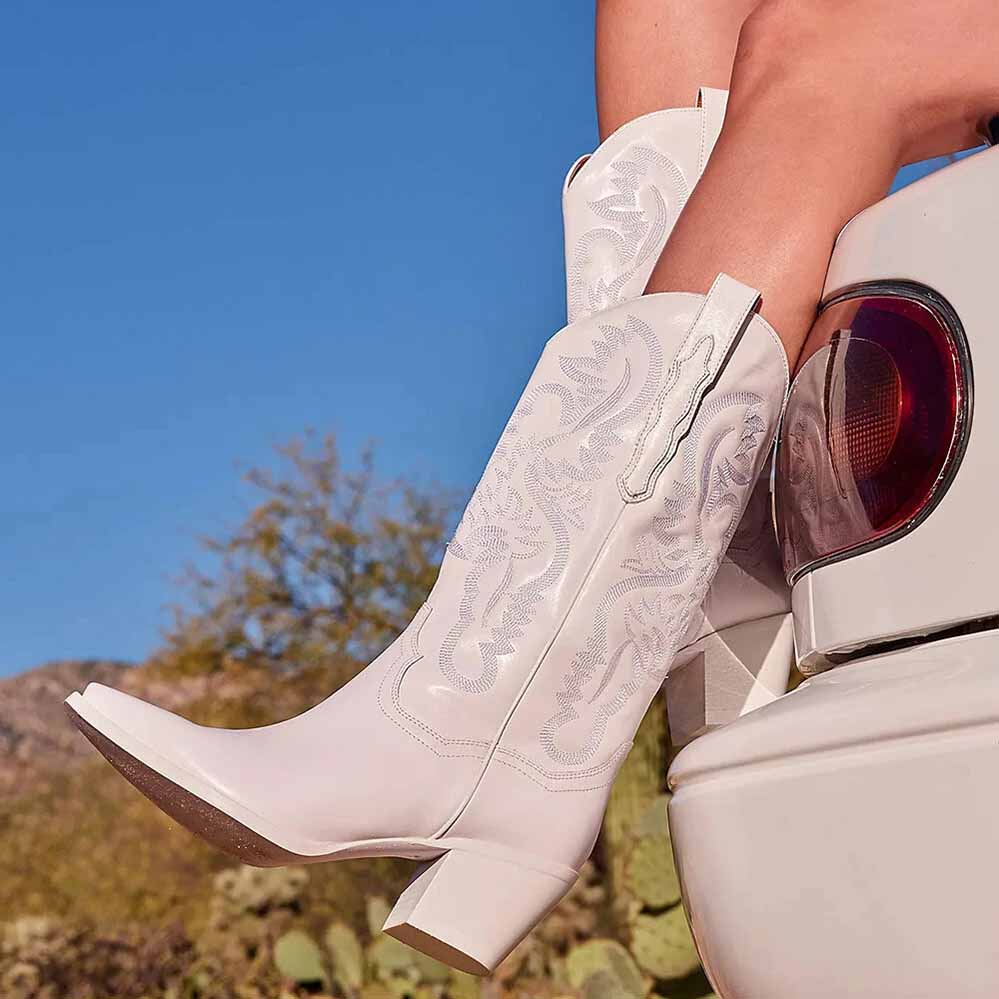 White embroidered cowgirl boots wedding with elegant floral designs for stylish outdoor events