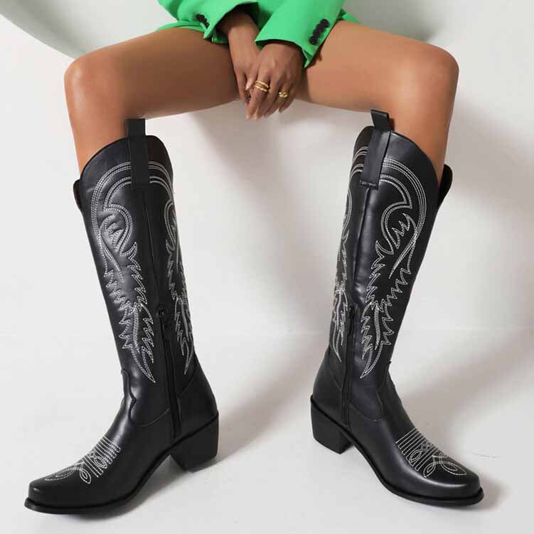 Tucomosi embroidered cowgirl knee high boots in black with intricate stitching and a pointed toe design