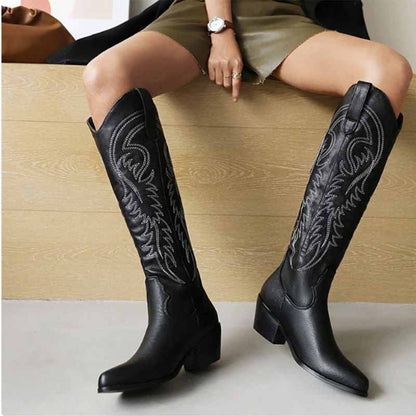 Stylish black embroidered square heel cowboy boots with intricate stitching detail, ideal for fashion-forward outfits