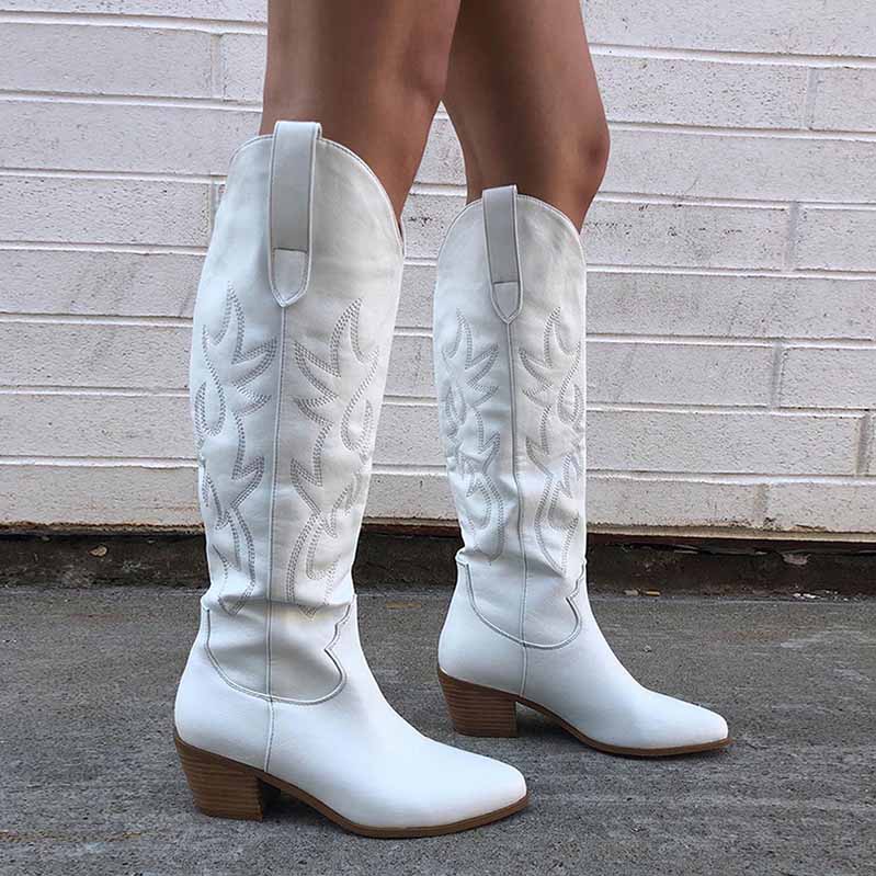 Stylish white embroidered square heel cowboy boots featuring intricate designs and a fashionable silhouette