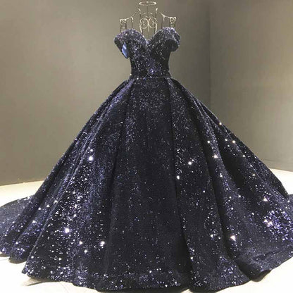 Elegant metallic ruffle sweep trail evening gown in navy blue with sparkling details for formal events