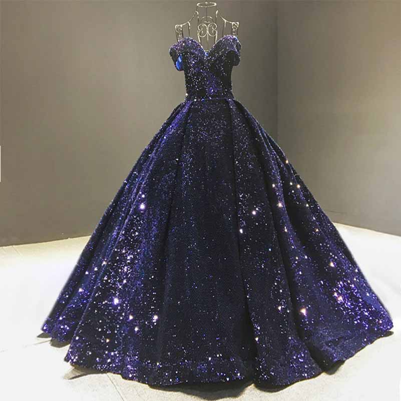 Metallic ruffle sweep trail evening gown in deep purple with a sparkling finish and elegant silhouette