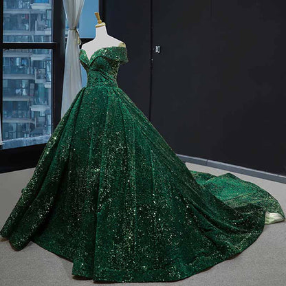 Stunning metallic ruffle sweep trail evening gown in rich emerald green for elegant formal events