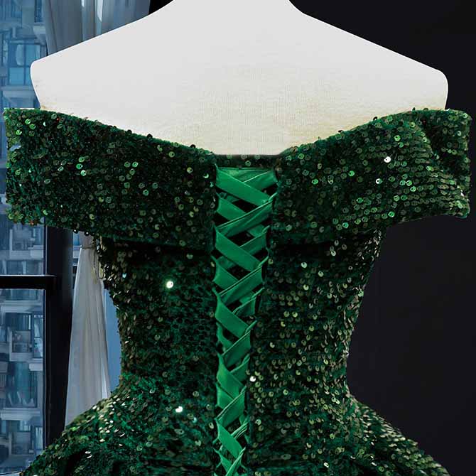 Elegant metallic ruffle sweep trail evening gown in green with intricate sequin detailing