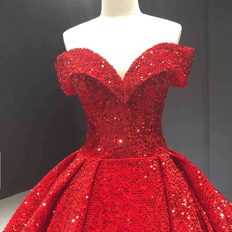 Red metallic ruffle sweep trail evening gown with sparkling sequins and elegant off-shoulder design