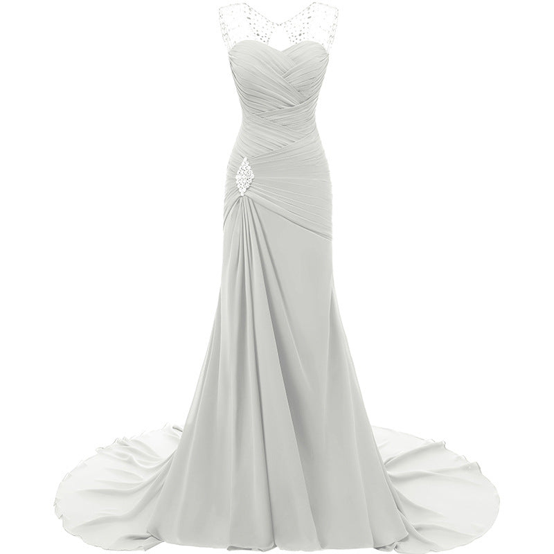 Elegant gray maxi dress with beaded straps and a flowing train, perfect for evening long dresses for weddings