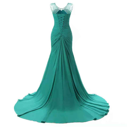 Elegant teal maxi dress with a fitted bodice and flowing skirt, perfect as evening long dresses for weddings.