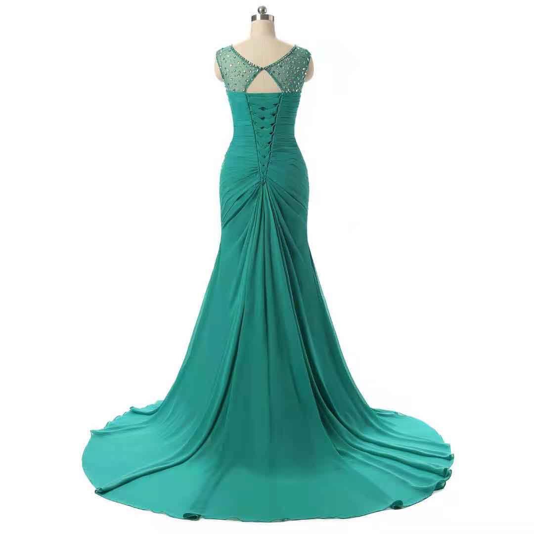 Elegant teal evening long dresses for weddings featuring a fitted bodice and flowing train