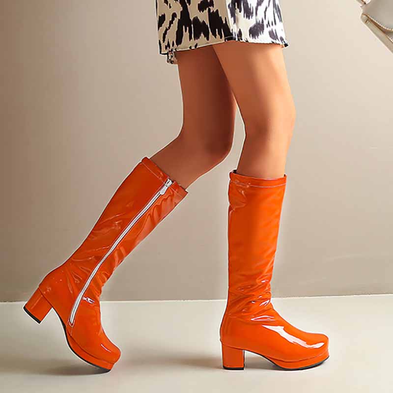 Stylish orange fashion boots with zipper for women featuring a glossy finish and chunky heel