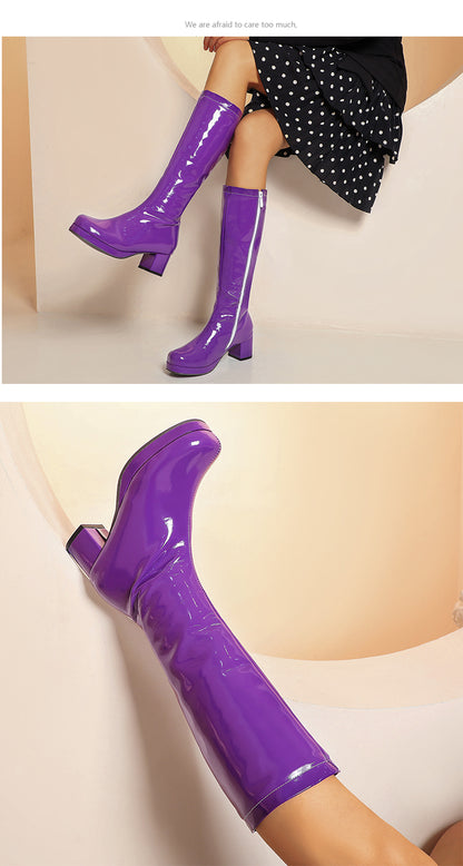 Stylish purple fashion boots with zipper for women featuring a shiny finish and block heels