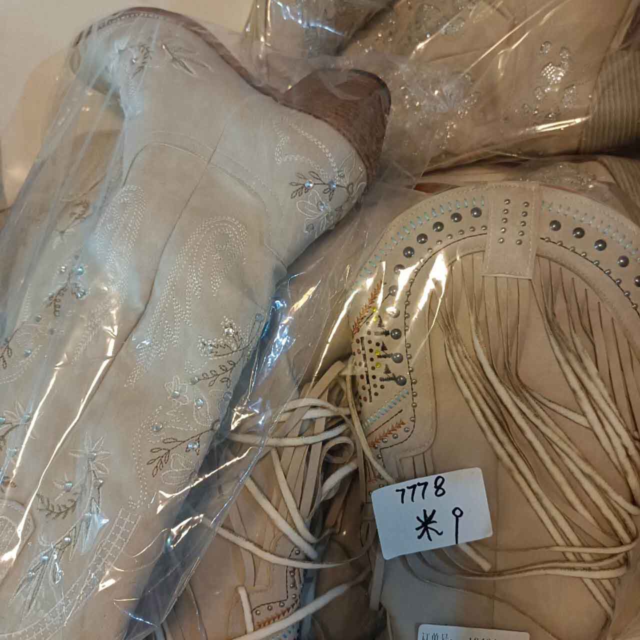 Floral embroidery wedding boots in beige with intricate detailing and elegant design for brides