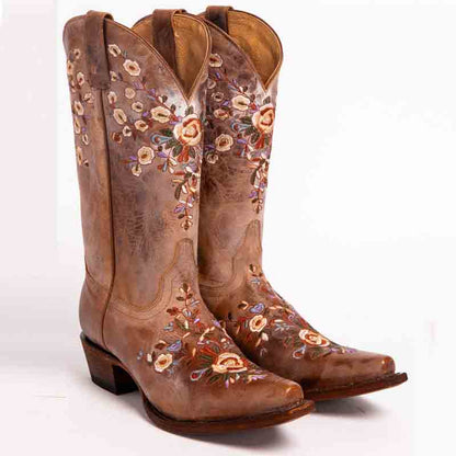 Flower embroidered cowgirl boots for women in tan leather with intricate floral designs
